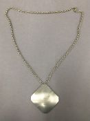 A 1960s Swedish Tenn pewter pendant on necklace. The pendant 5.5 cm high.