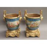 A pair of gilt metal mounted porcelain cache pots. 33 cm high.