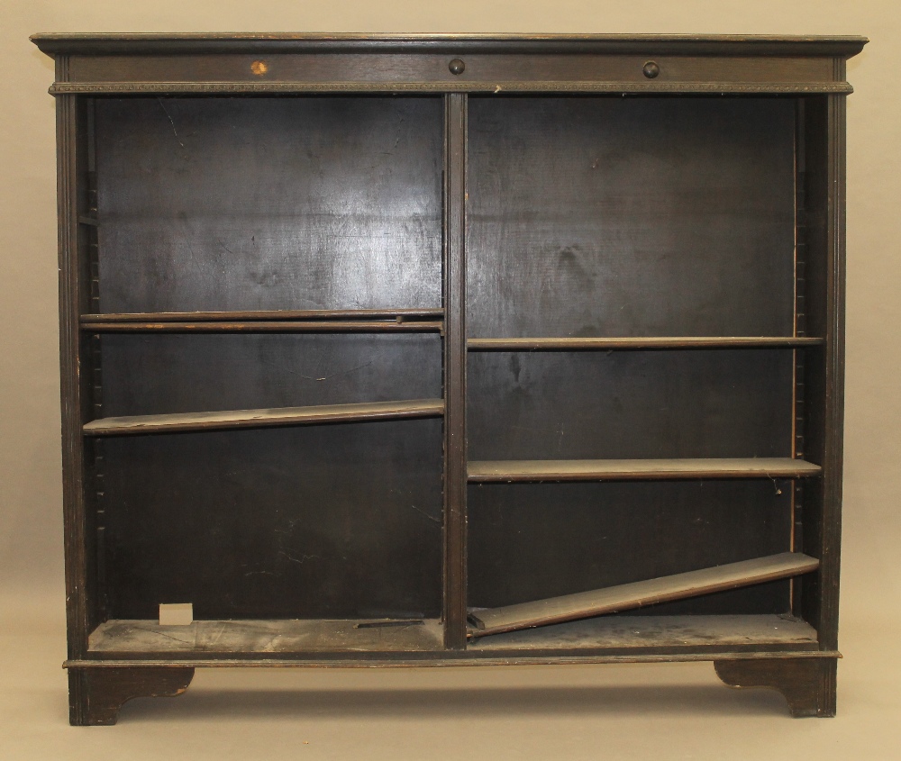 A 1920s oak open bookcase. 162 cm wide.