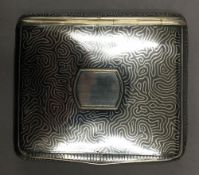 A 19th century Continental niello and silver snuff/cigarette box. 7.5 cm wide. 115.6 grammes.