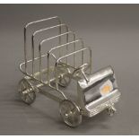 A silver plated car toast rack. 17 cm long.