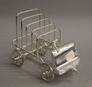 A silver plated car toast rack. 17 cm long.