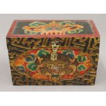 A hand painted Tibetan box. 23 cm wide.