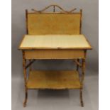 A Victorian bamboo washstand. 73.5 cm wide.