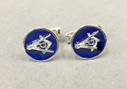 A pair of silver Masonic cufflinks. 1 cm diameter.