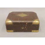 A 19th century French brass bound leather box. 28 cm wide.