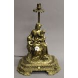 A late 19th century bronze lamp formed as a woman and two children. 42 cm high.