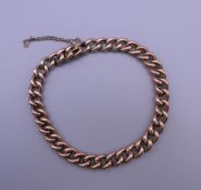 An Edwardian 9 ct rose gold bracelet. 19 cm long. 13.4 grammes.