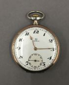 A silver Omega pocket watch. 4.5 cm diameter.