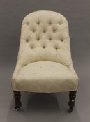 A Victorian upholstered nursing chair. 87 cm high.