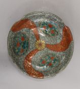 An Oriental crackle glaze dish. 18.5 cm diameter.