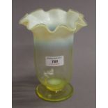 An uranium and vaseline glass vase. 18 cm high.