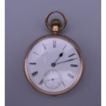 A 9 ct gold pocket watch. 4.5 cm diameter. 82.1 grammes total weight.