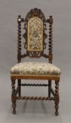 A Victorian oak barley twist nursing chair. 96 cm high.