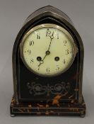 An Edwardian silver mounted tortoiseshell mantel clock. 24 cm high.