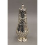 A silver sugar caster. 17.5 cm high. 5.2 troy ounces.