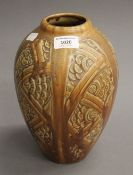 A Belgian Art Deco pottery vase by Roger Guerin, circa 1930. 25.5 cm high.