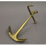 An anchor desk ornament. 20 cm long.