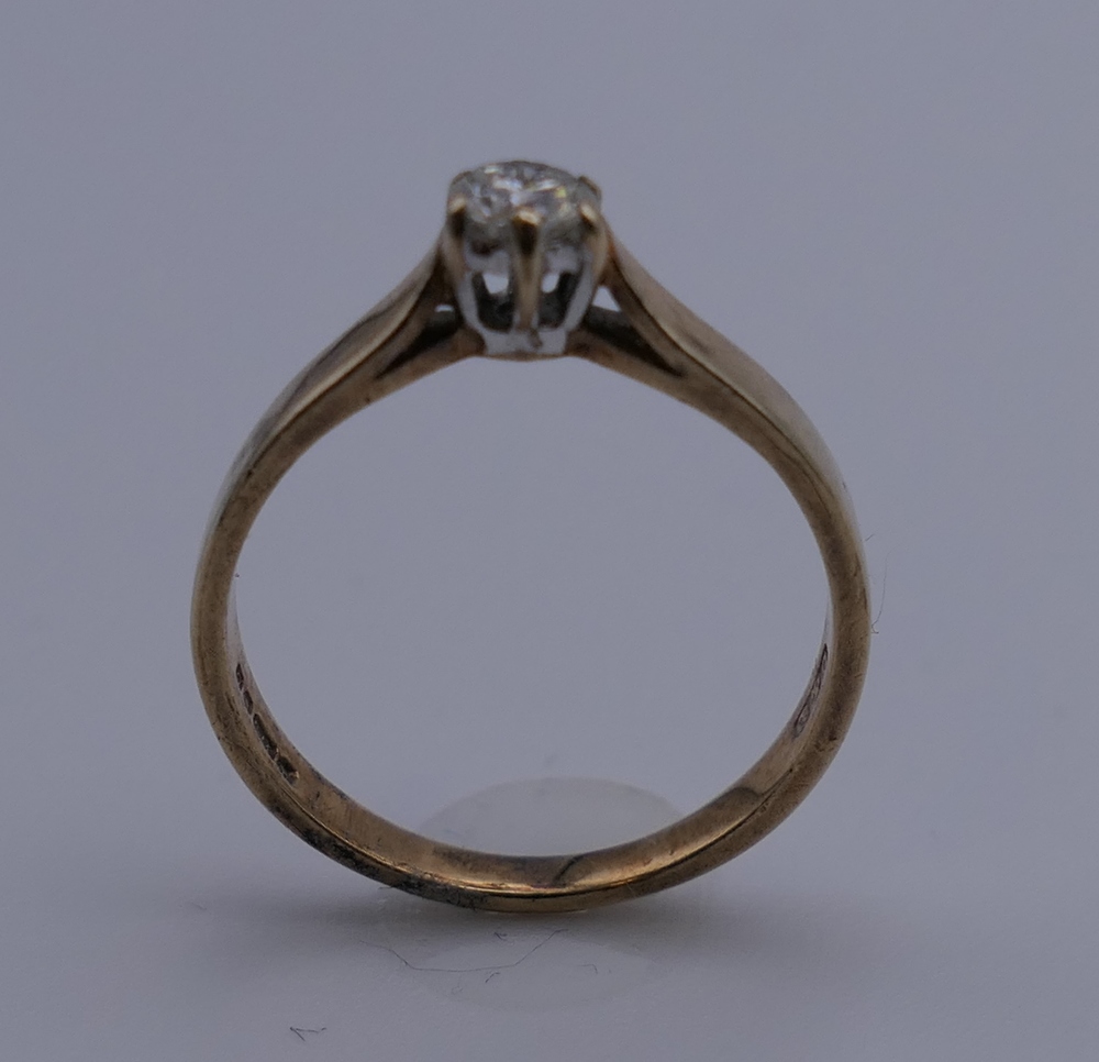 A 9 ct gold diamond solitaire ring. Ring size J. 1.4 grammes total weight. - Image 2 of 5
