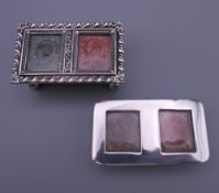 Two silver stamp boxes. The largest 6 cm wide.