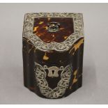 A Victorian silver mounted tortoiseshell tea caddy. 10 cm high.