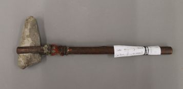 A late 19th century stone head hammer (Maul), possibly Canadian Indian. 35 cm long.