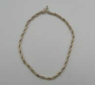 A silver necklace. 44 cm long. 62 grammes.