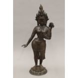 An antique patinated bronze model of Buddha. 42 cm high.