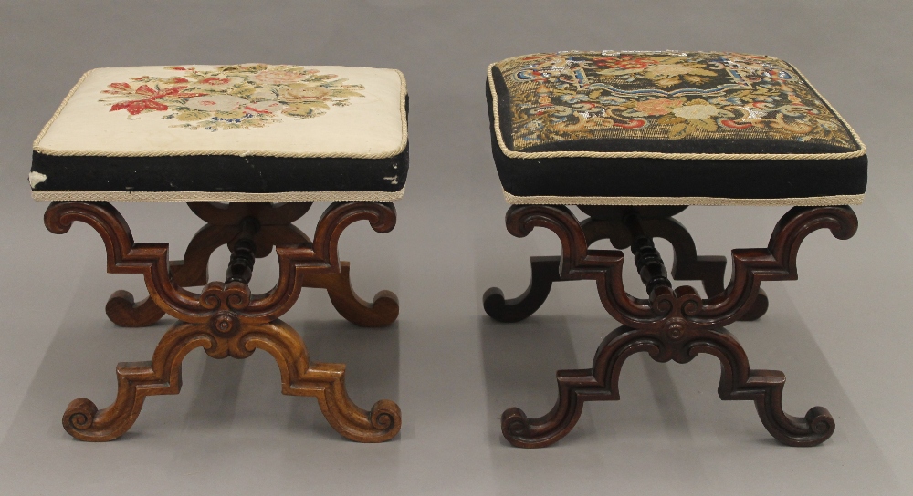 A matched pair of Victorian tapestry covered rosewood x-frame stools.