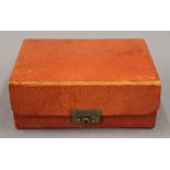 An Asprey leather jewellery box. 18 cm wide.