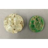 Two Chinese jade pendants. The largest 5 cm diameter.