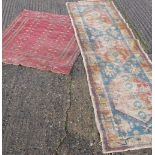 Two small antique rugs. 100 x 125 cm and 71 x 270 cm.