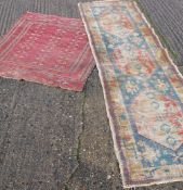 Two small antique rugs. 100 x 125 cm and 71 x 270 cm.
