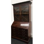 A 19th century mahogany bureau bookcase. 210 cm high x 112 cm wide.