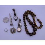 A quantity of costume jewellery, watches, etc.