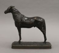 EMMANUEL FREMIET (1824-1910) French, a patinated bronze animalier sculpture of a stallion, signed.