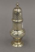 A silver pepper. 12.5 cm high. 3 troy ounces.