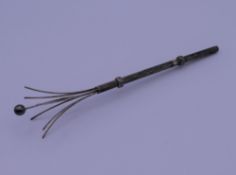 A sterling silver swizzle stick. 8.5 cm long.