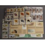 A quantity of cigarette cards, etc.