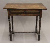 An 18th century oak side table. 87 cm wide.