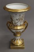 A gilt chinoiserie decorated porcelain vase. 38 cm high.