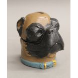 A dog's head form bronze ink well. 8.5 cm high.