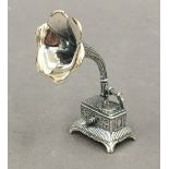 A small model of a gramophone. 5 cm high.