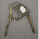 An Indonesian betel nut cutter. 14 cm long.