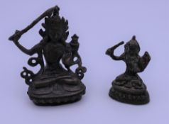 Two small bronze models of buddha. The largest 7.5 cm high.