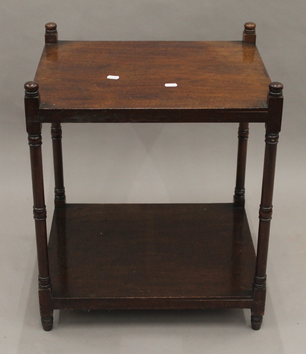 A 19th century mahogany two tier whatnot. 59.5 cm high.