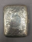 A 1945 hallmarked silver cigarette case. 6.5 cm wide. 56.7 grammes.