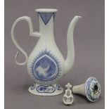 A Japanese porcelain ewer. 22 cm high.