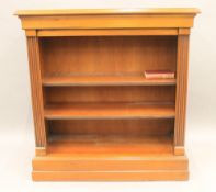 A modern bookcase. 92 cm wide.