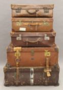 A collection of vintage trunks and cases.